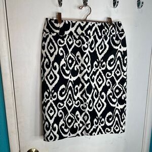 This is a White House Black Market black and white ikat pattern stretch pencil s